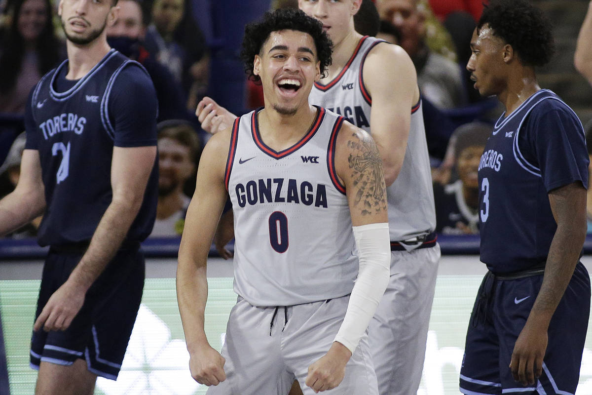 Gonzaga guard Julian Strawther celebrates his basket during the second half of an NCAA college ...