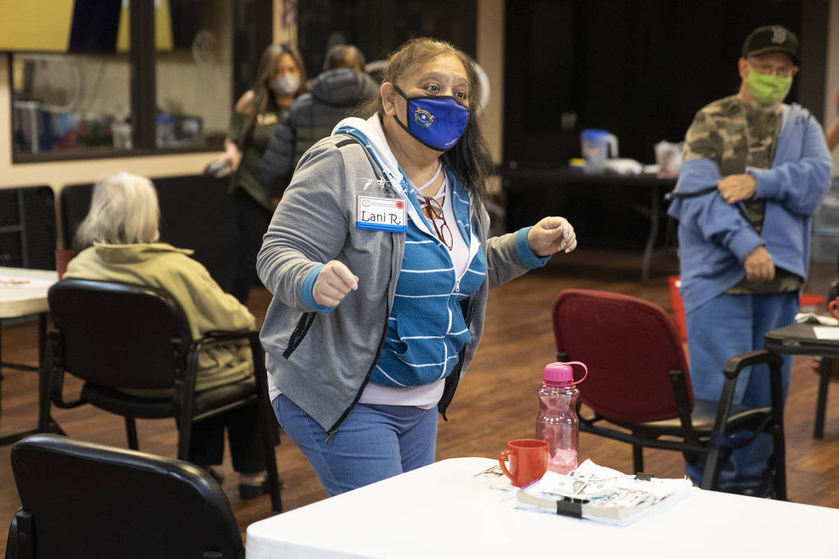 Lani Reardon, 61, dances to the music during a physical activity at Nevada Adult Daycare Health ...