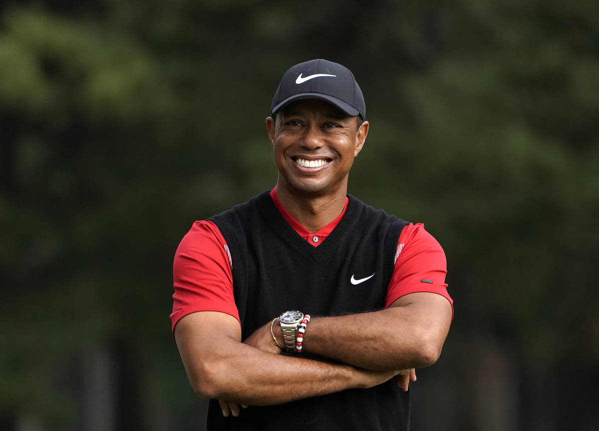 In this Oct. 28, 2019, file photo, Tiger Woods smiles during the winner's ceremony after winnin ...