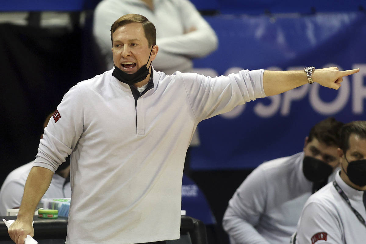 UNLV head coach T.J. Otzelberger instructs his team during the second half of an NCAA college b ...