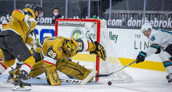 Golden Knights goaltender Marc-Andre Fleury (29) gets a skate on the puck shot on goal by San J ...