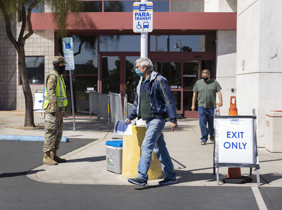 People leave after getting at a COVID-19 testing center at the Stan Fulton Building, on Wednesd ...