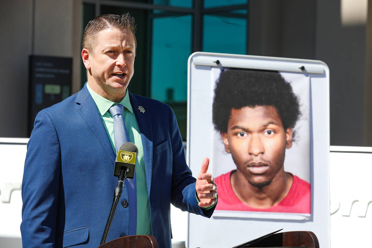 Sex Crimes Lieutenant Richard Meyers addresses the media next to a photo of Laparese Jones, the ...