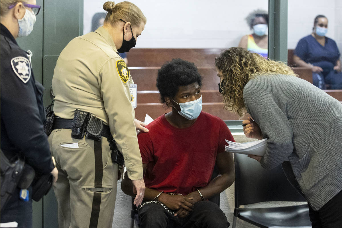 Laparese Jones, 18, who is charged with sexually assaulting a woman in west Las Vegas, listens ...