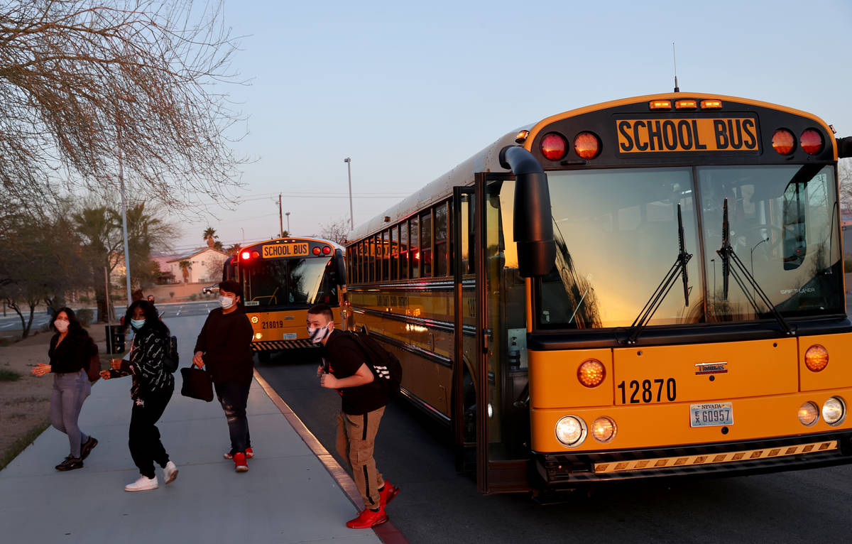Students arrive for the first day of in-person education at Spring Valley High School in Las Ve ...