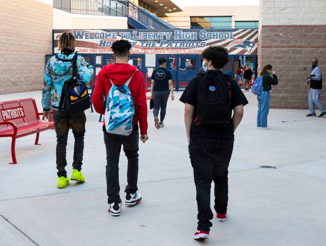 Students arrive at Liberty High School, on Monday, March 22, 2021, in Henderson. The next group ...
