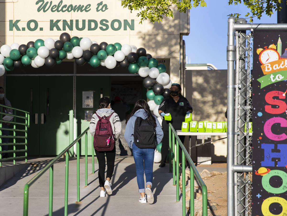 Students arrive at K.O. Knudson Academy of the Arts, on Monday, March 22, 2021, in Henderson. T ...