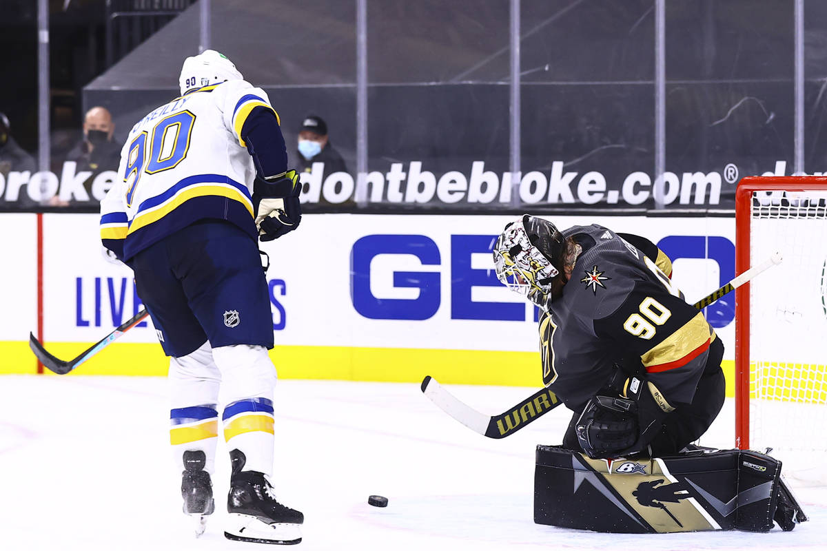 Golden Knights goaltender Robin Lehner (90) blocks a shot by St. Louis Blues center Ryan O'Reil ...