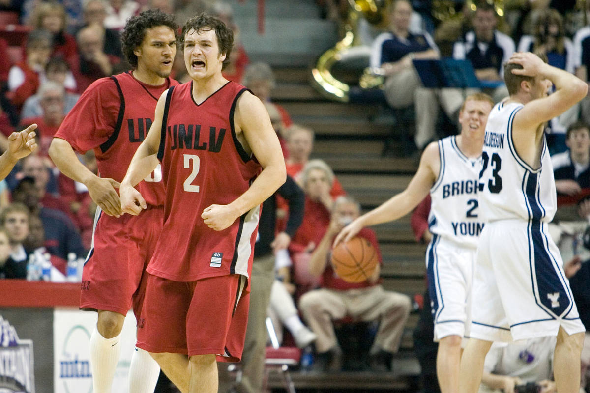 UNLV players Curtis Terry, left, and Kevin Kruger react to a call against BYU in the second ha ...