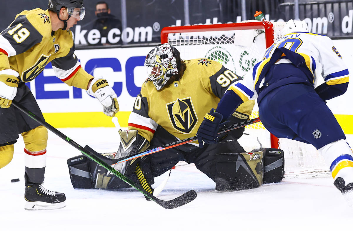 Golden Knights goaltender Robin Lehner (90) blocks a shot from St. Louis Blues' Ryan O'Reilly, ...