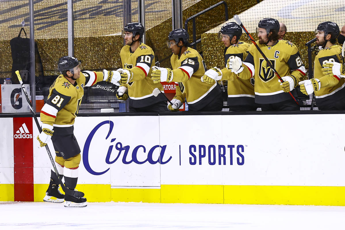 Golden Knights' Jonathan Marchessault (81) celebrates his goal with teammates during the first ...