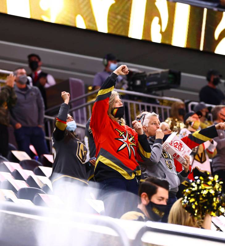 Golden Knights fans celebrate after a goal by Jonathan Marchessault, not pictured, during the f ...