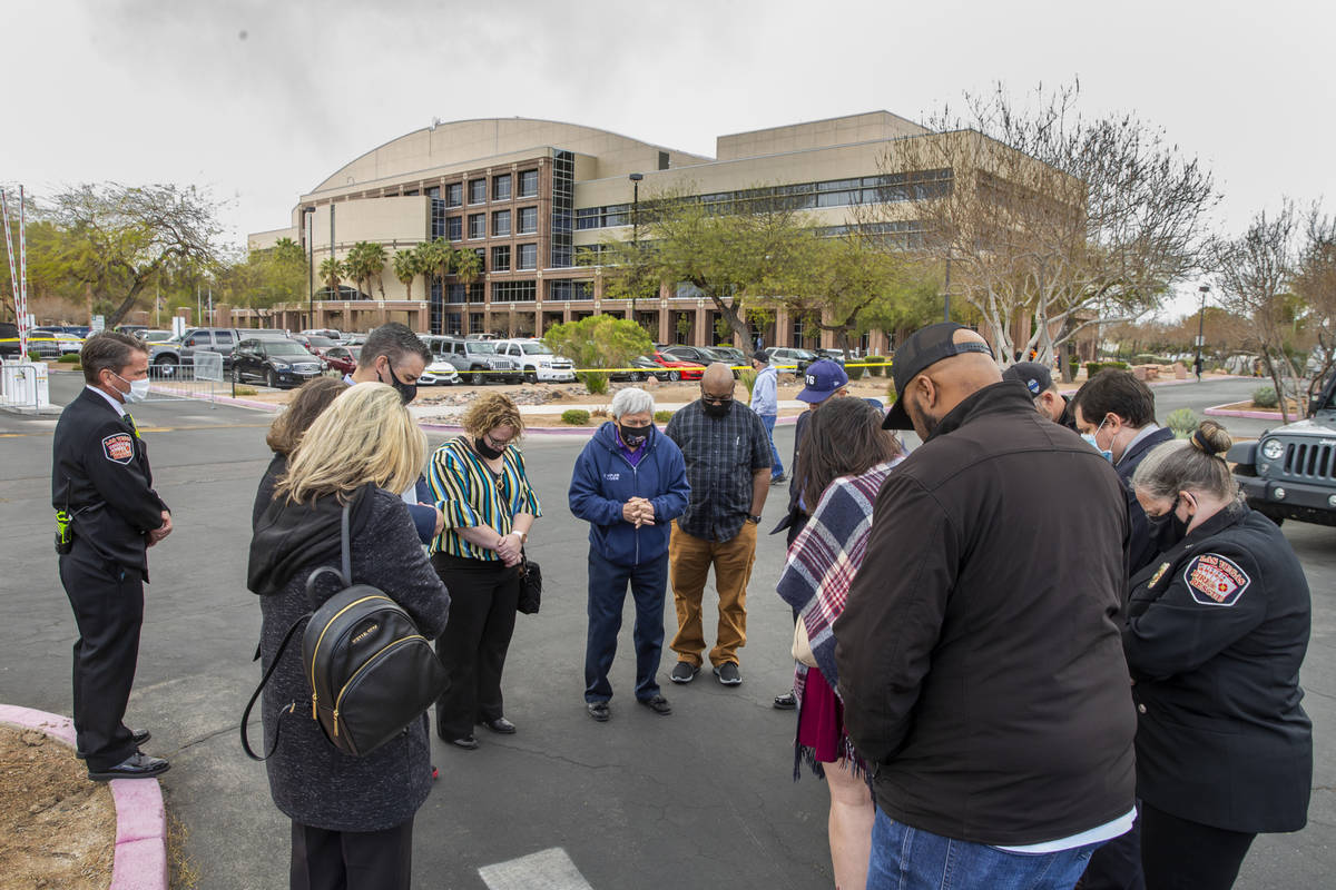 Senior Chaplain Ty Chew gives a prayer of thanks after a suspicious item on the ground was inve ...