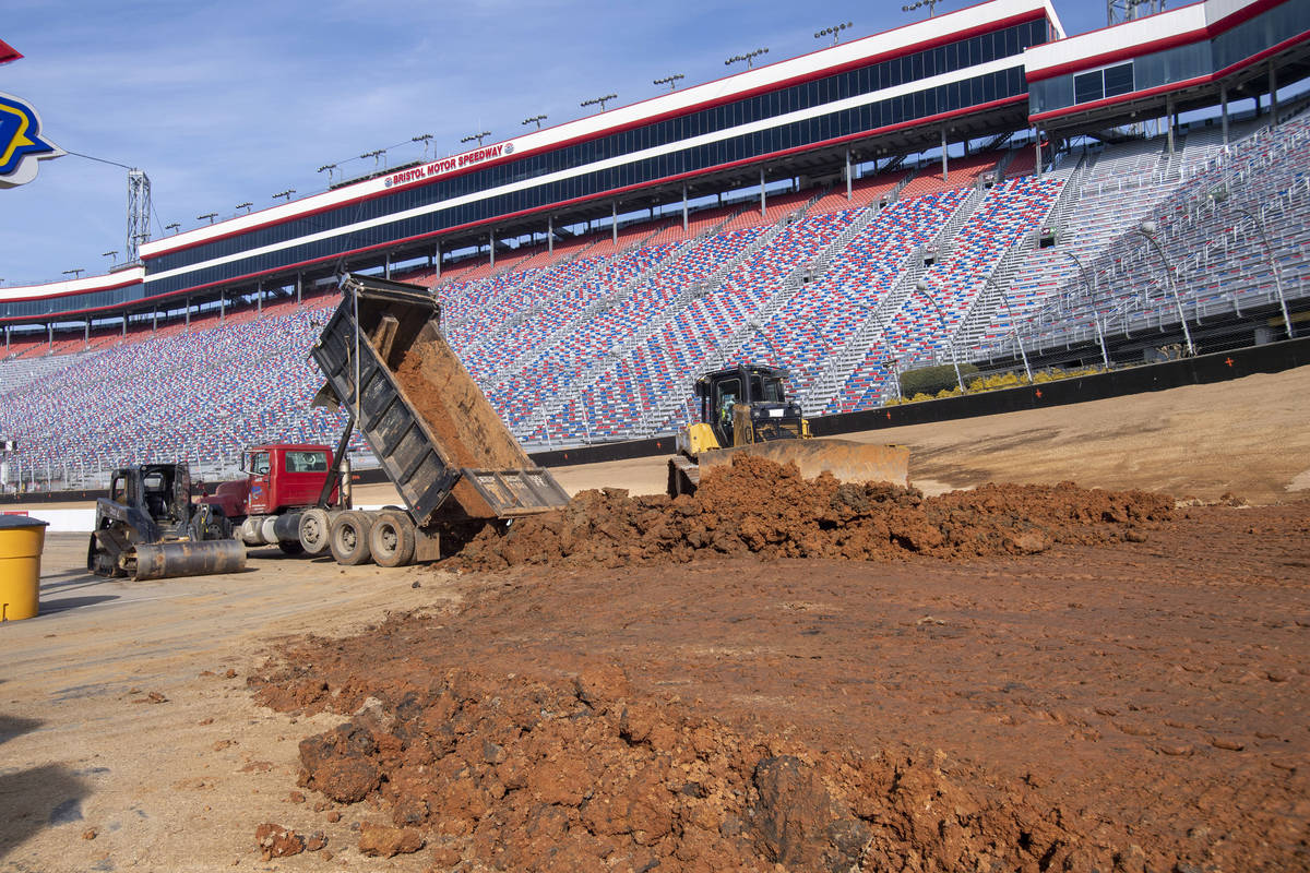 Workers turn Bristol Motor Speedway into a dirt track, in Bristol, Tenn., in this Thursday, Jan ...