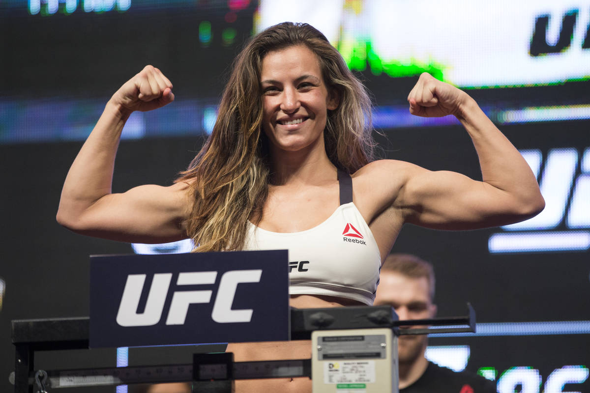 UFC fighter Miesha Tate poses during her weigh-in for UFC 196 at the MGM Grand Garden Arena on ...