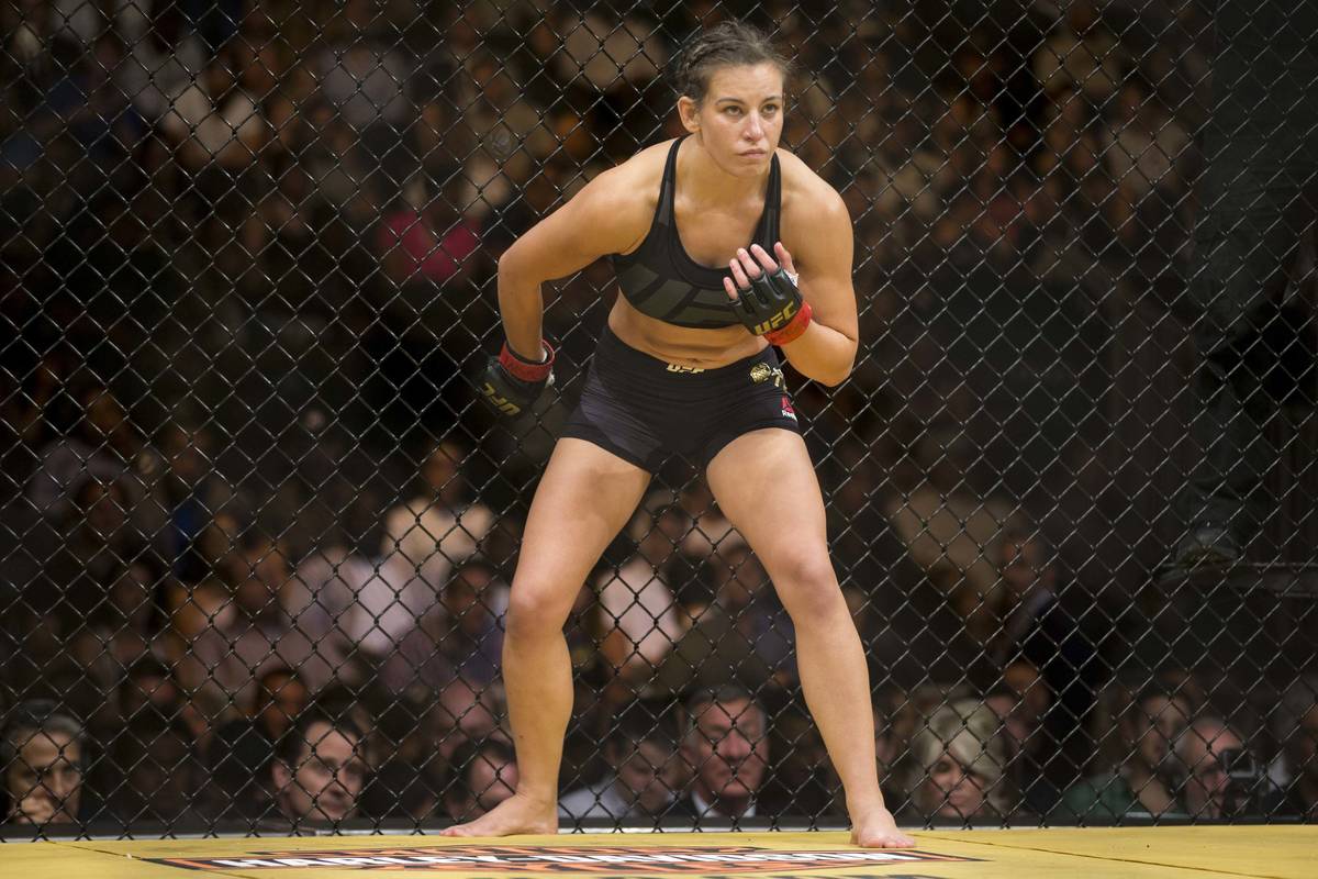Miesha Tate gets ready to fight against Amanda Nunes in the women's bantamweight title bout dur ...