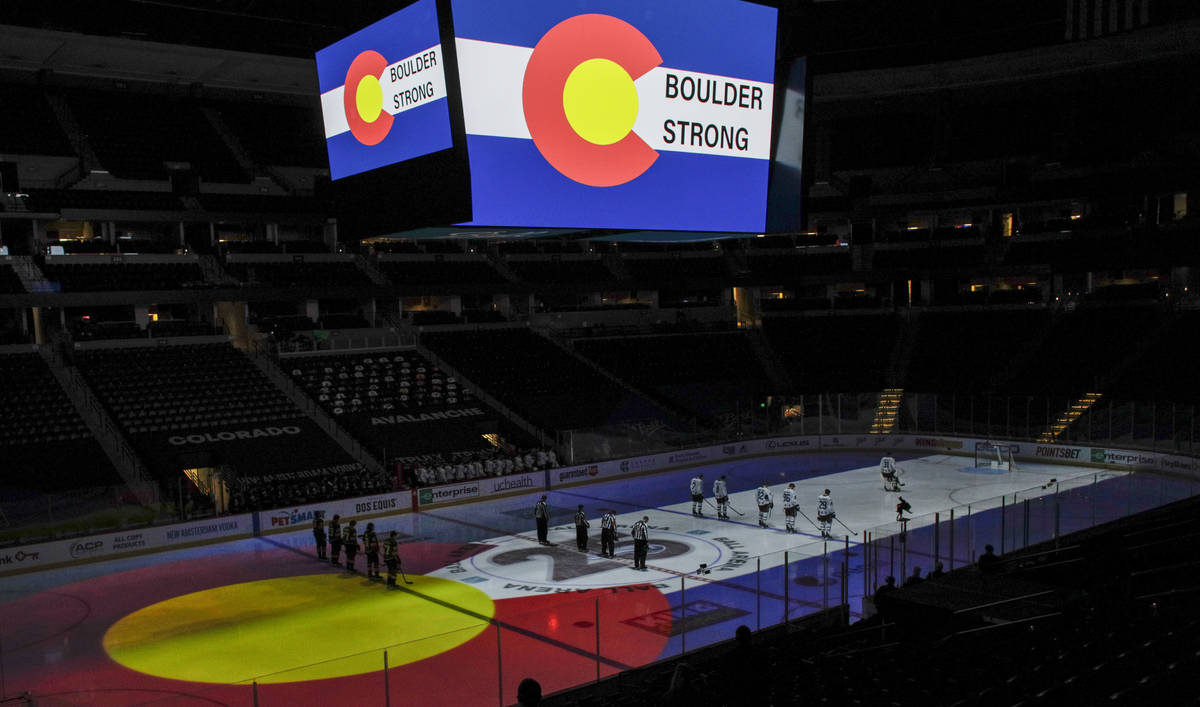 The Colorado Avalanche and the Vegas Golden Knights observe a moment of silence before an NHL h ...