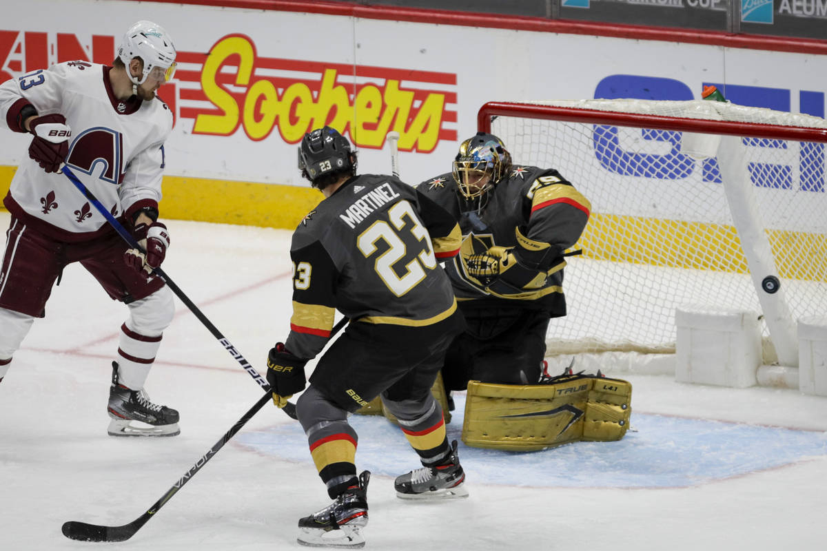 The puck passes Vegas Golden Knights goaltender Marc-Andre Fleury (29) for a goal as Colorado A ...