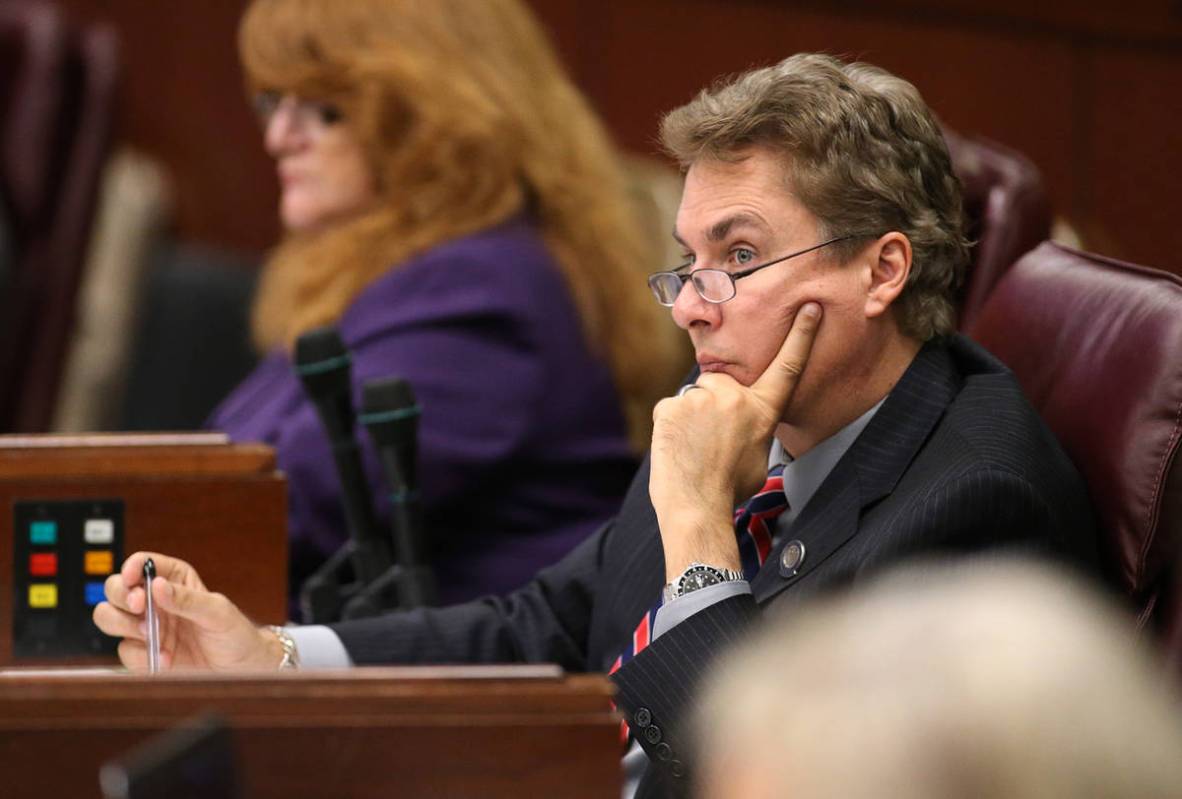 Nevada Assemblyman Brent Jones, R-Las Vegas, works on the Assembly floor at the Legislative Bui ...