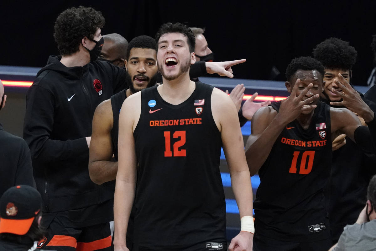 Oregon State center Roman Silva (12) celebrates after a Sweet 16 game against Loyola Chicago in ...