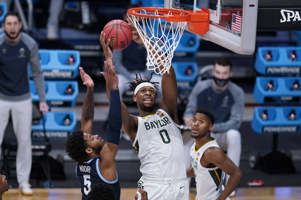 Baylor forward Flo Thamba (0) drives on Baylor guard Jordan Turner (5) in the first half of a S ...