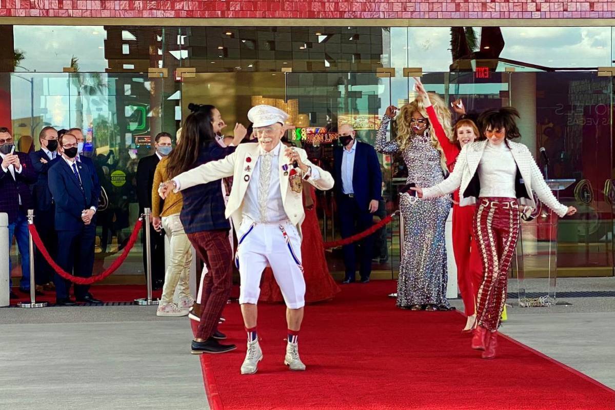 Dancers move up the red carpet and into the venue during the Virgin Hotels Las Vegas opening ce ...