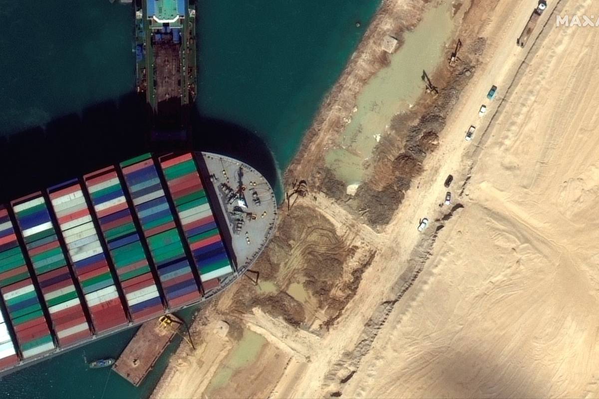 This satellite image from Maxar Technologies shows the cargo ship MV Ever Given stuck in the Su ...