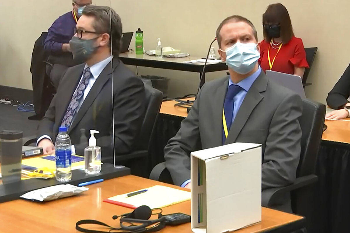 In this image from video, defense attorney Eric Nelson, left, and former Minneapolis police off ...