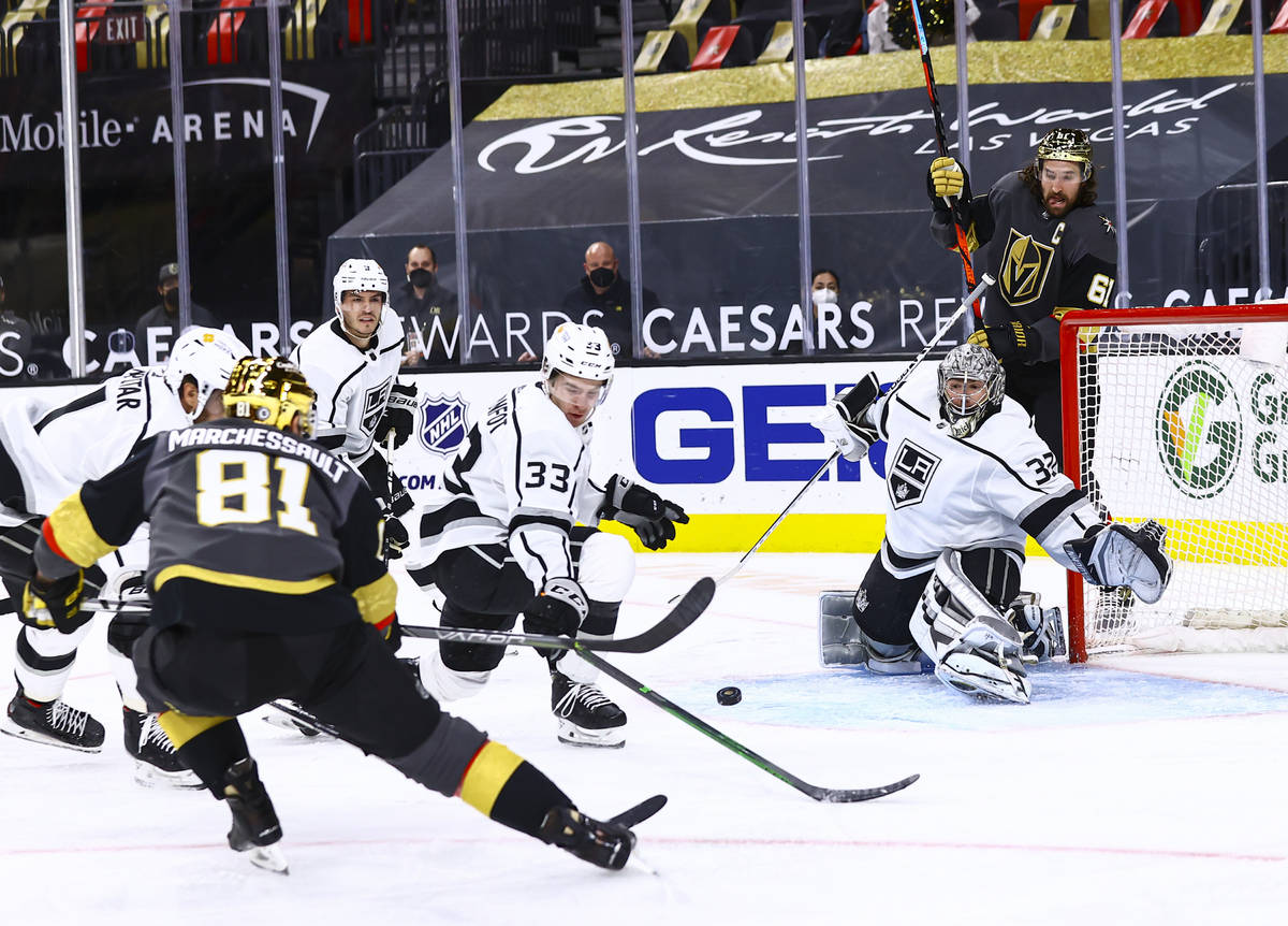 Los Angeles Kings goaltender Jonathan Quick (32) looks to block a shot from Golden Knights' Jon ...