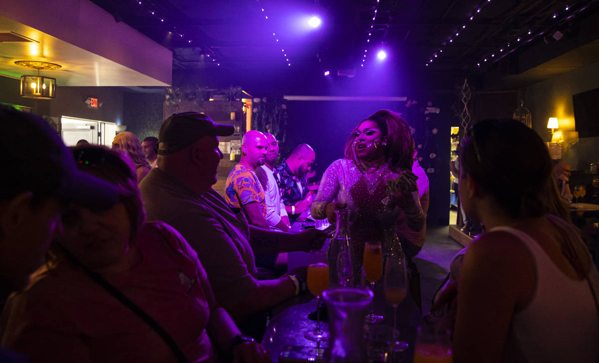 Drag queen Des'ree D. St. James performs during the "Bottomless Drag Brunch" show at ...