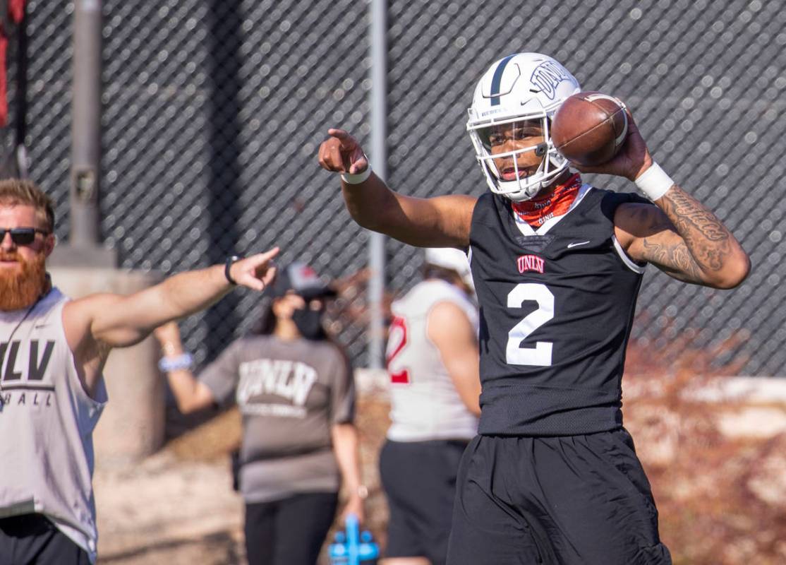 UNLV quarterback Doug Brumfield (2) gives directions to a receiver during the first spring foot ...