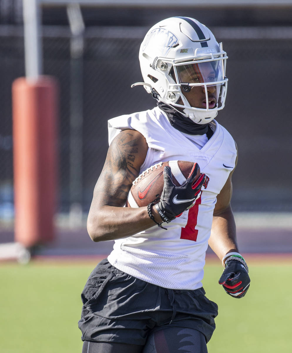 UNLV wide receiver Kyle Williams (1) runs after a catch during the first spring football practi ...