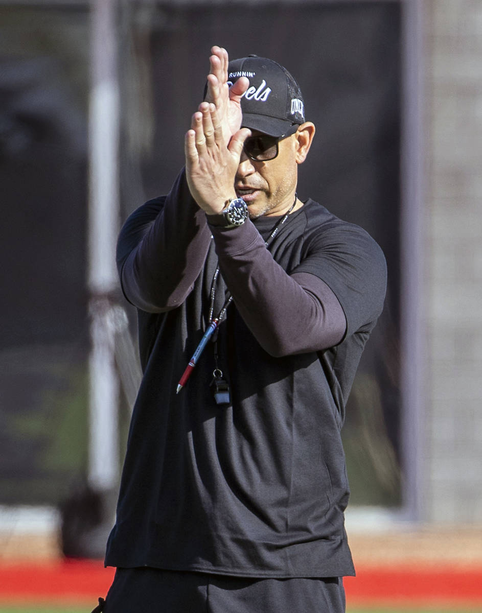 UNLV head coach Marcus Arroyo gives instructions during the first spring football practice at R ...