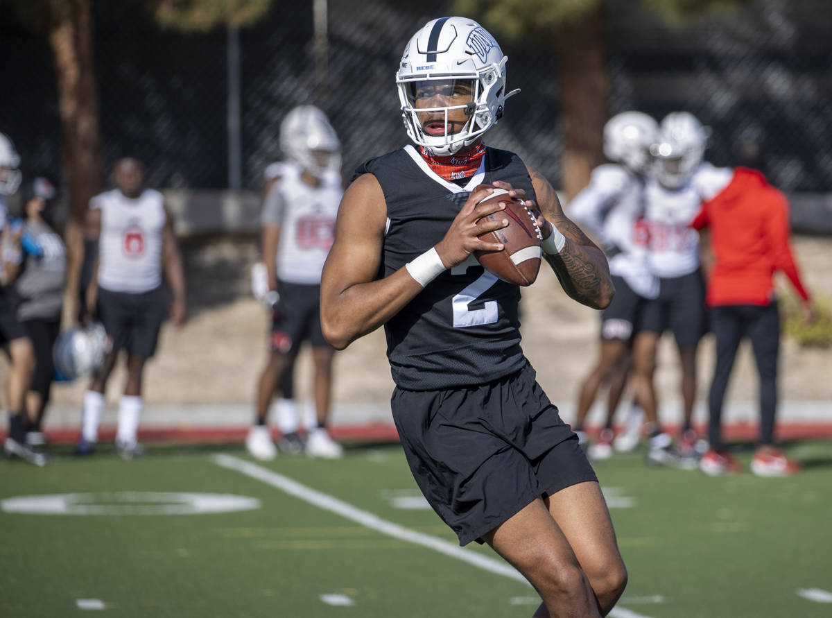 UNLV quarterback Doug Brumfield (2) drops back for a pass during the first spring football prac ...