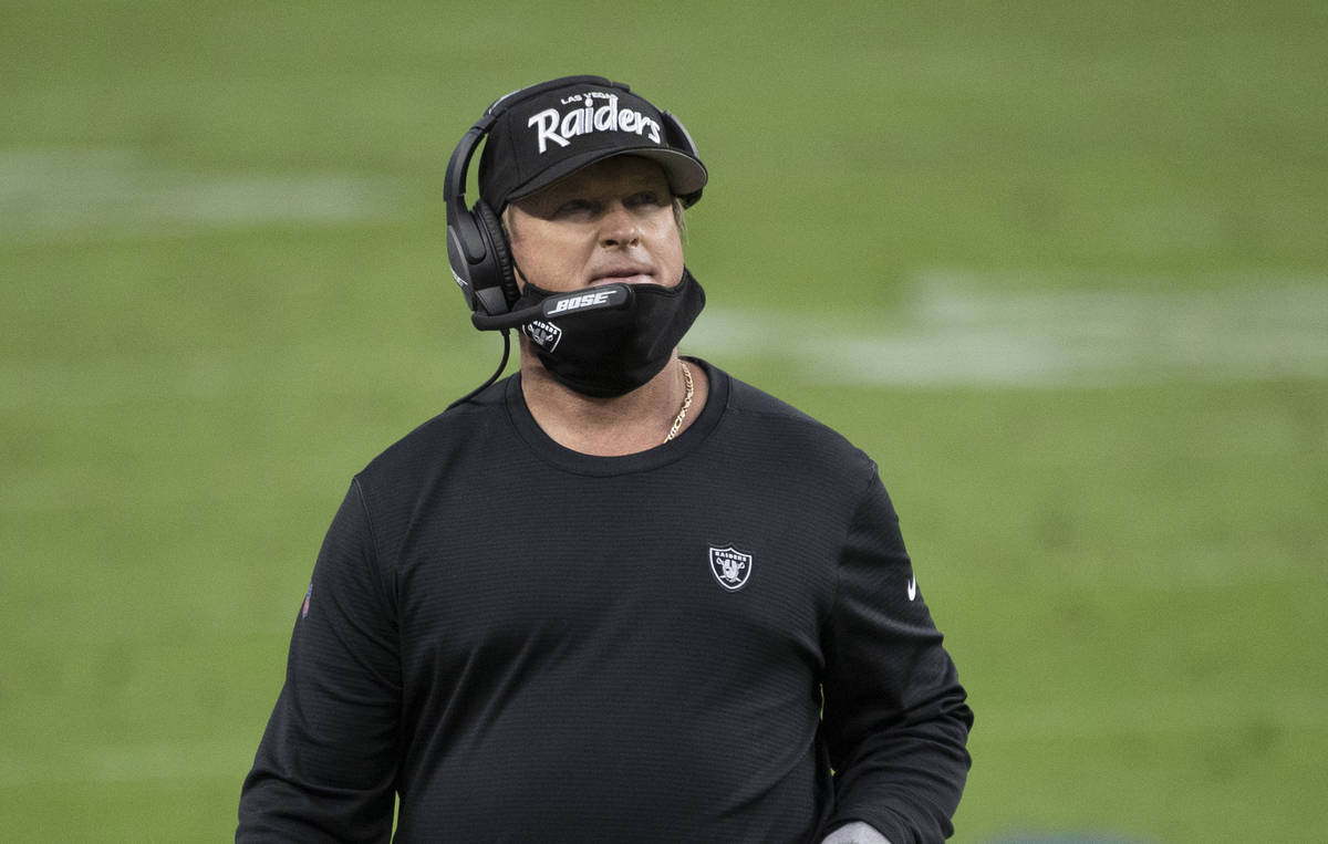 Las Vegas Raiders head coach Jon Gruden looks up at the scoreboard in the fourth quarter of an ...