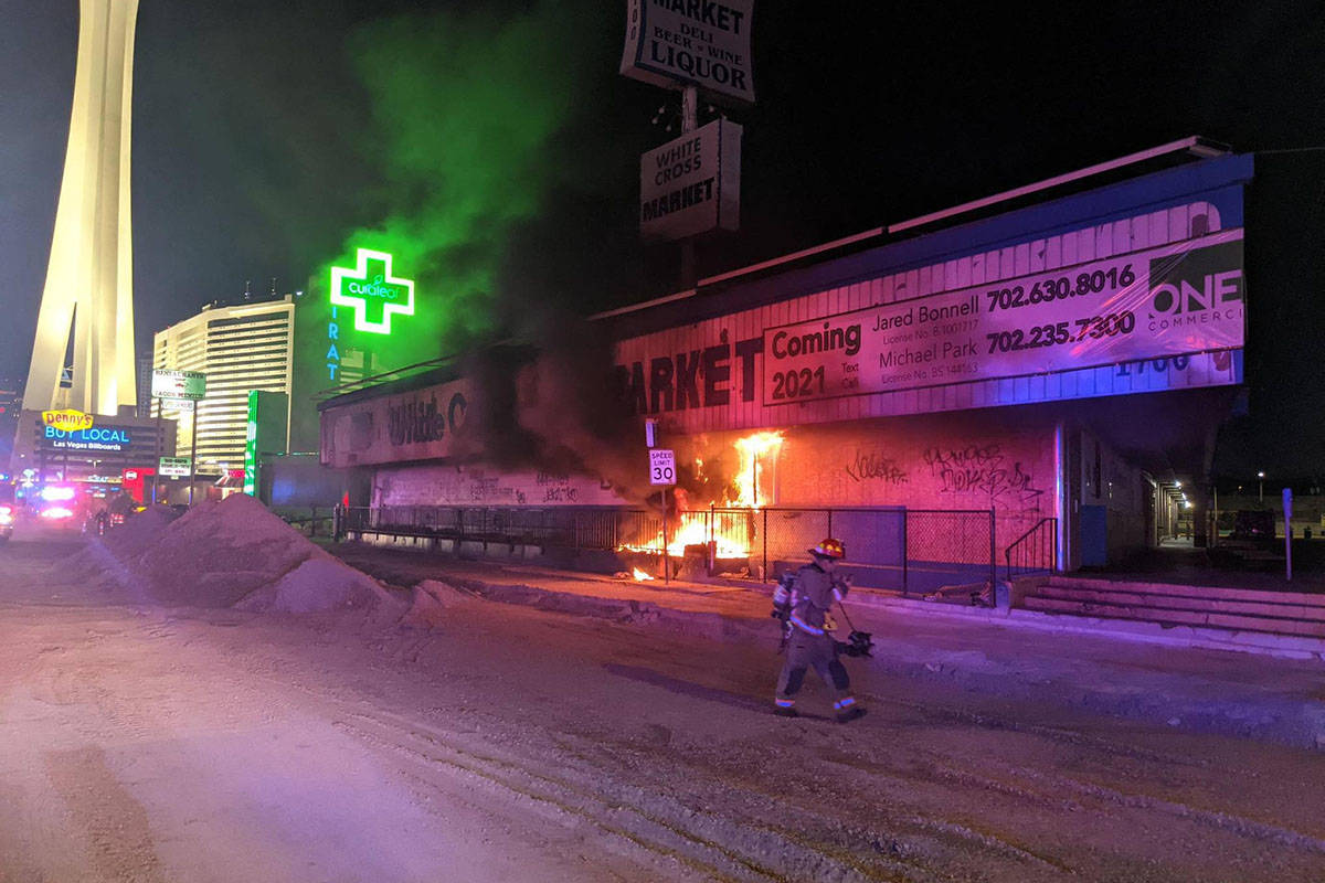 Firefighters respond to a fire at the former White Cross Drugs building at 1700 Las Vegas Blvd. ...