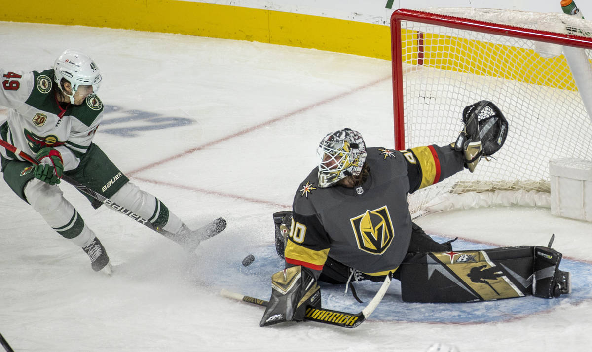 Minnesota Wild center Victor Rask (49) takes a shot of Golden Knights goaltender Robin Lehner ( ...