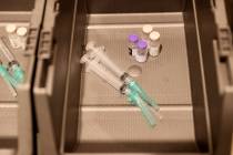 Pfizer vaccine, diluent and syringes used for dilution in bins at the Cashman Center COVID-19 v ...