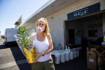 Debbie Newson-Babina, owner of Las Vegas Floral Wholesale, poses for a portrait with sold-out l ...