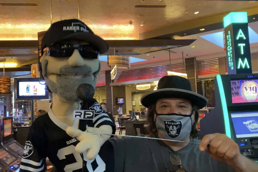 Raider Puppet, left, and ventriloquial practitioner David Michael are shown at Raiders Tavern & ...