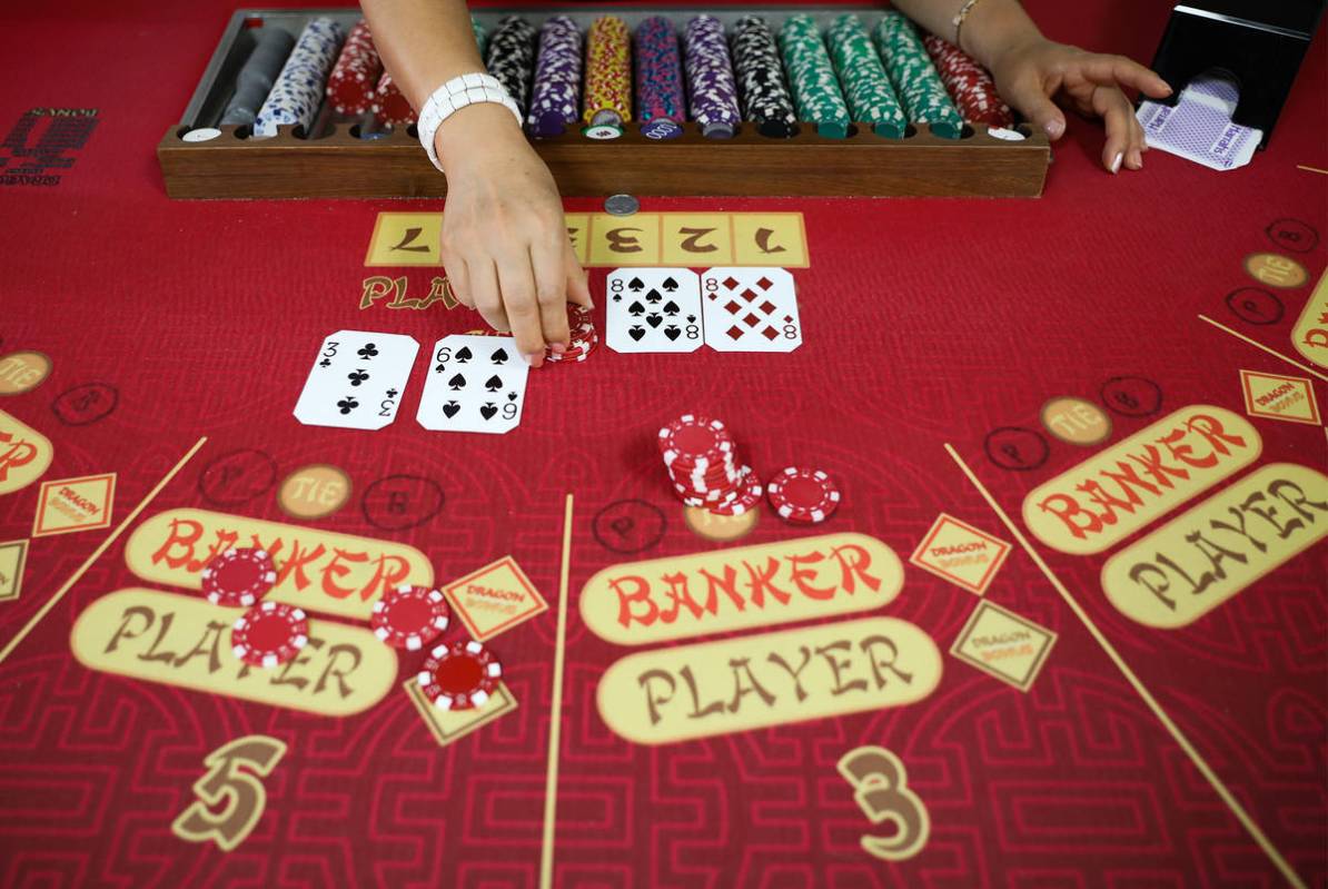 Soon Lee practice dealing for baccarat at the CEG Dealer School in Las Vegas, Thursday, April 1 ...