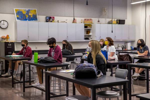 Students keep socially distanced while attending Steve Morrill's anatomy and physiology class a ...