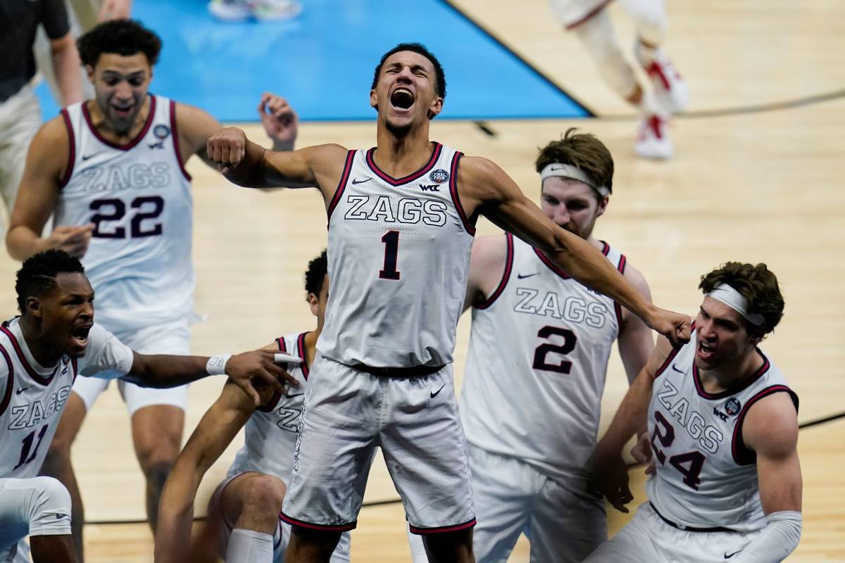 Gonzaga guard Jalen Suggs (1) celebrates making the game winning basket against UCLA during ove ...