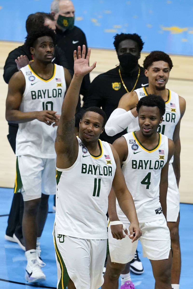 Baylor players walk off the court at the end of a men's Final Four NCAA college basketball tour ...