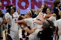 Stanford players celebrate at the end of the championship game against Arizona in the women's F ...