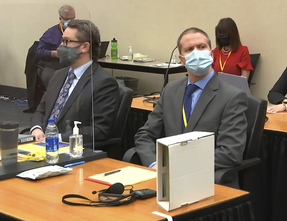 FILE - In this March 29, 2021 file image from video, defense attorney Eric Nelson, left, and fo ...