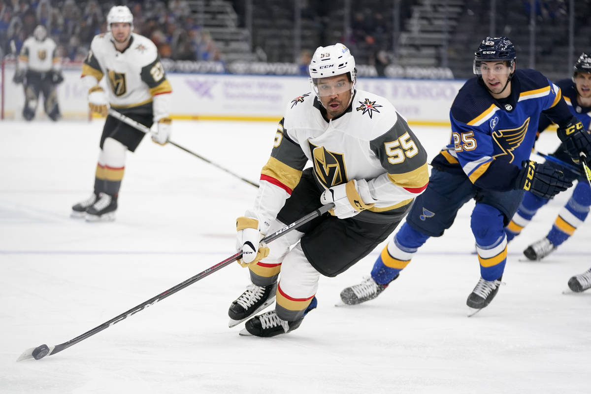 Vegas Golden Knights' Keegan Kolesar (55) brings the puck down the ice as St. Louis Blues' Jord ...