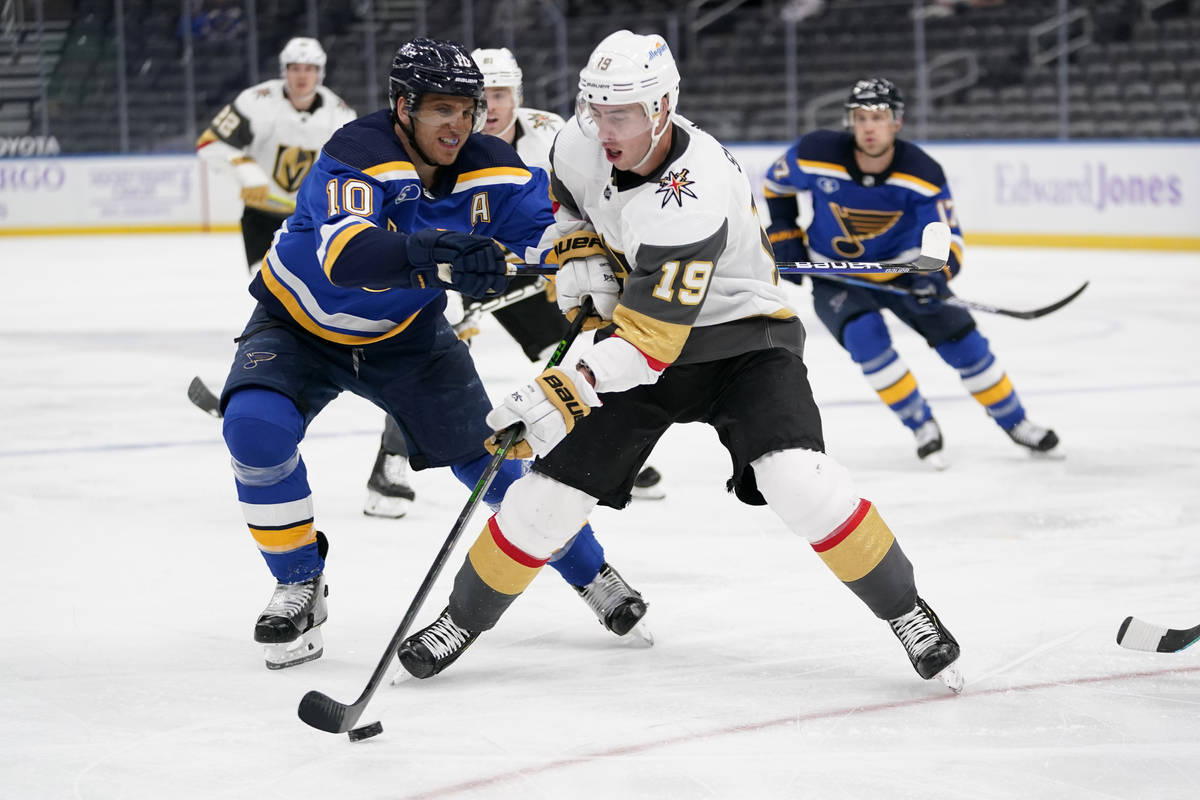 Vegas Golden Knights' Reilly Smith (19) controls the puck as St. Louis Blues' Brayden Schenn (1 ...