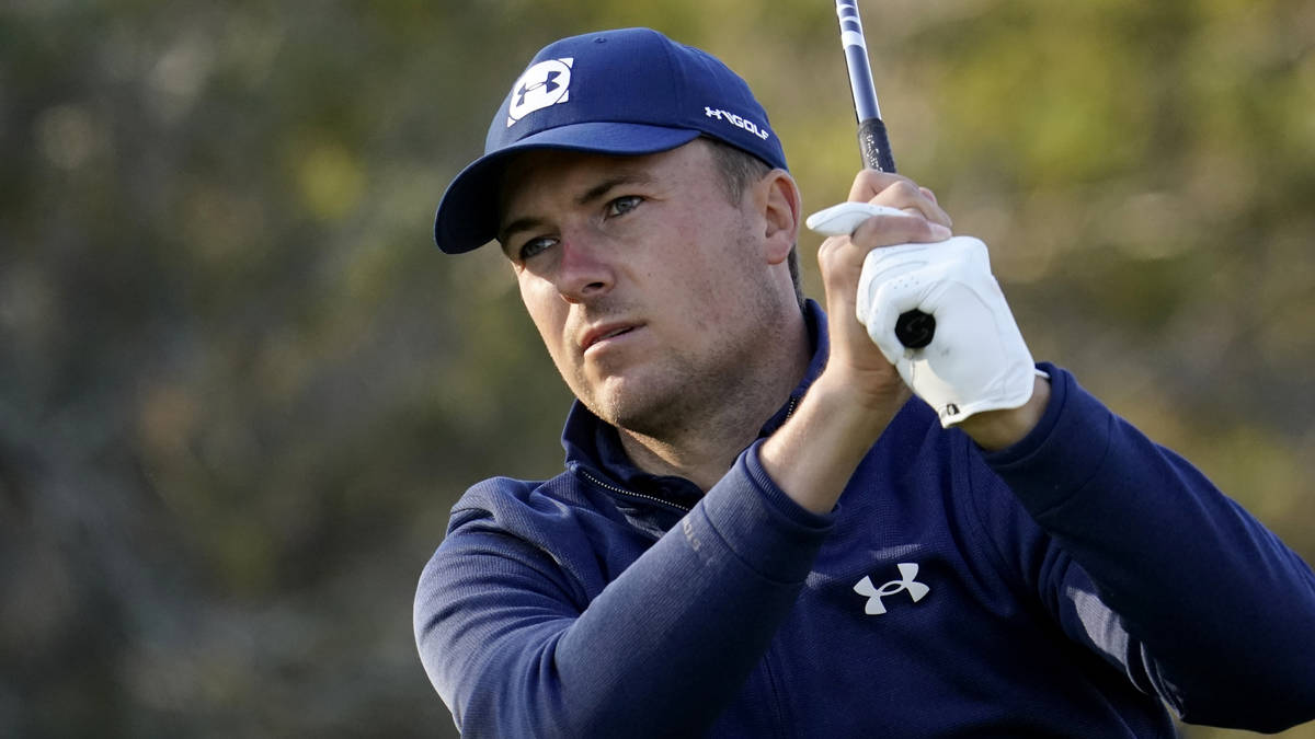 Jordan Spieth watches his drive on the 12th hole during the first round of the Texas Open golf ...