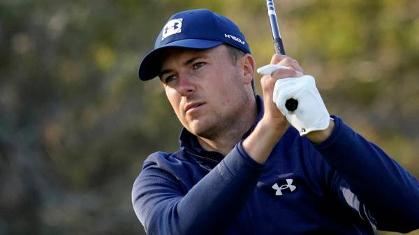 Jordan Spieth watches his drive on the 12th hole during the first round of the Texas Open golf ...